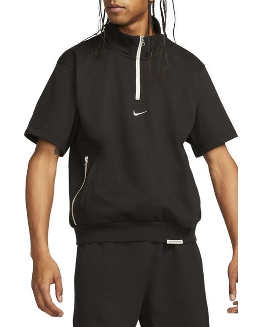 Nike Dri-FIT Standard Issue Short Sleeve Quarter Zip Top in Black at
