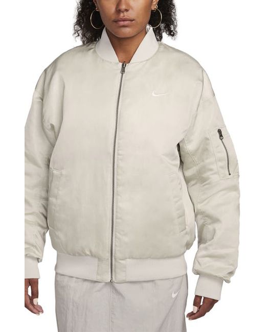 Nike Sportswear Reversible Varsity Quilted Bomber Jacket in Light Orewood Sail at X-Small Regular