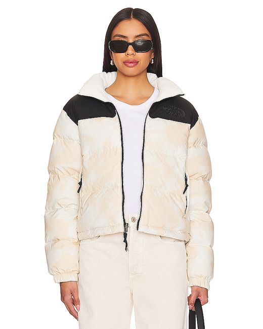 The North Face Crinkle Rev Nuptse Jacket Cream. also 1X
