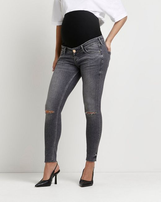 River Island ripped mid rise maternity skinny jeans