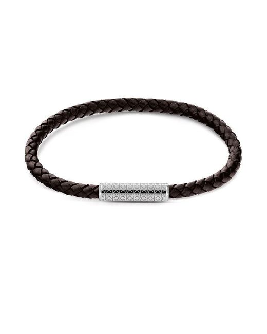 Calvin Klein Gents black leather and stainless steel single wrap bracelet.