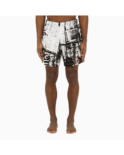 Alexander McQueen Abstract print swim shorts with logo