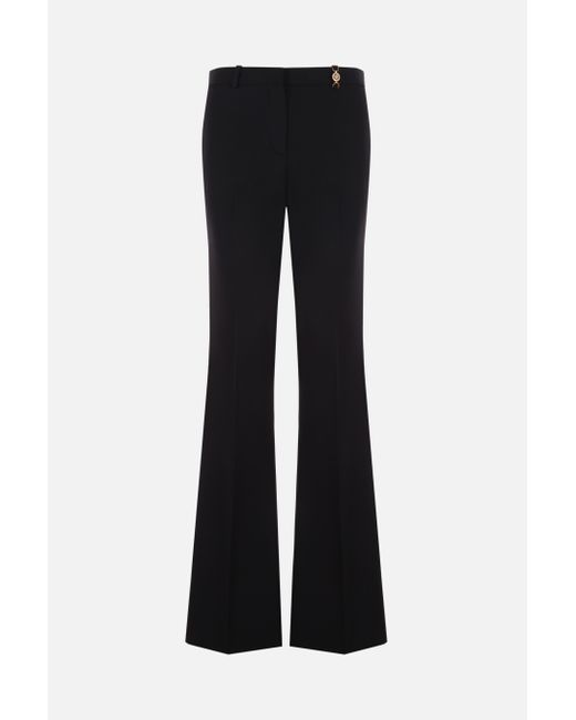 Versace stretch wool flared pants with Medusa detail